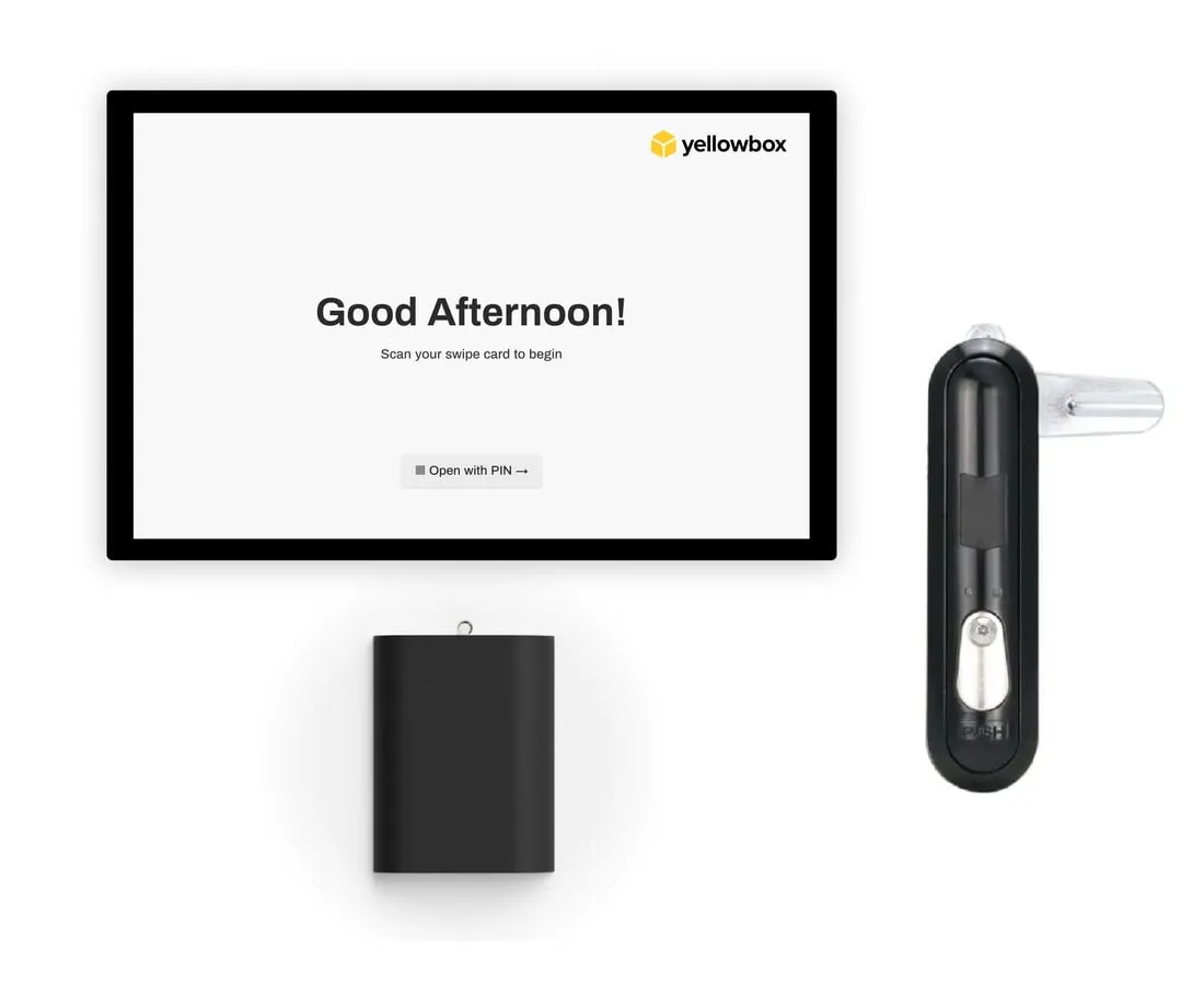 Yellowbox Kiosk touchscreen and card reader beside an electronic swing handle.